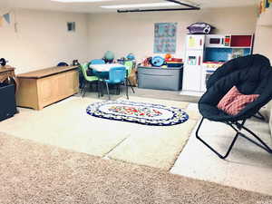 300 ft2 area not counted toward square feet. Storage or kids play area!