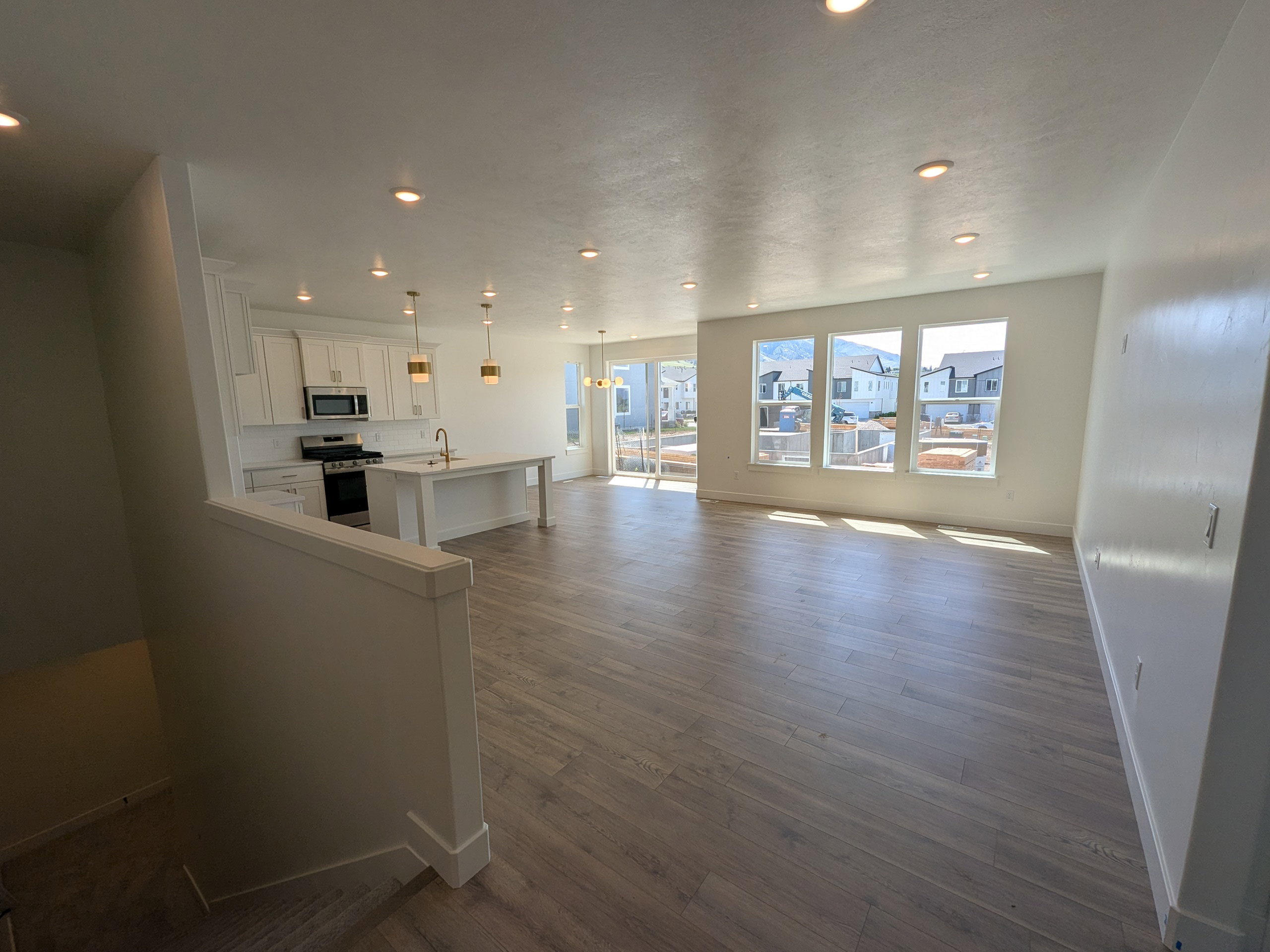 Living room featuring dark wood finished floors and recessed lighting