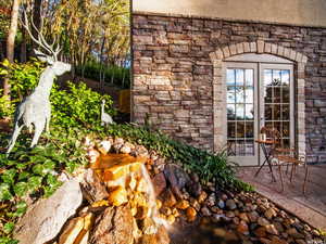 Patio off Guest bedroom overlooking stream