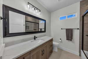 Full bathroom with vanity and light tile patterned flooring