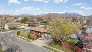 Aerial perspective of suburban area with mountains