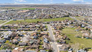 Aerial overview of property's location with nearby suburban area