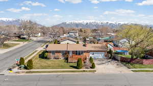 Aerial view of residential area with a mountain backdrop