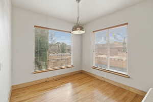 Spare room with light wood finished floors and baseboards