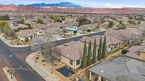 Aerial view of residential area with a mountainous background
