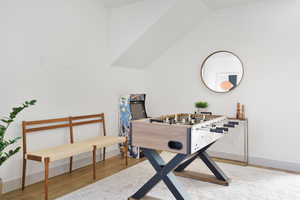 Playroom with light wood-style flooring