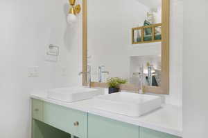 Full bathroom with double vanity