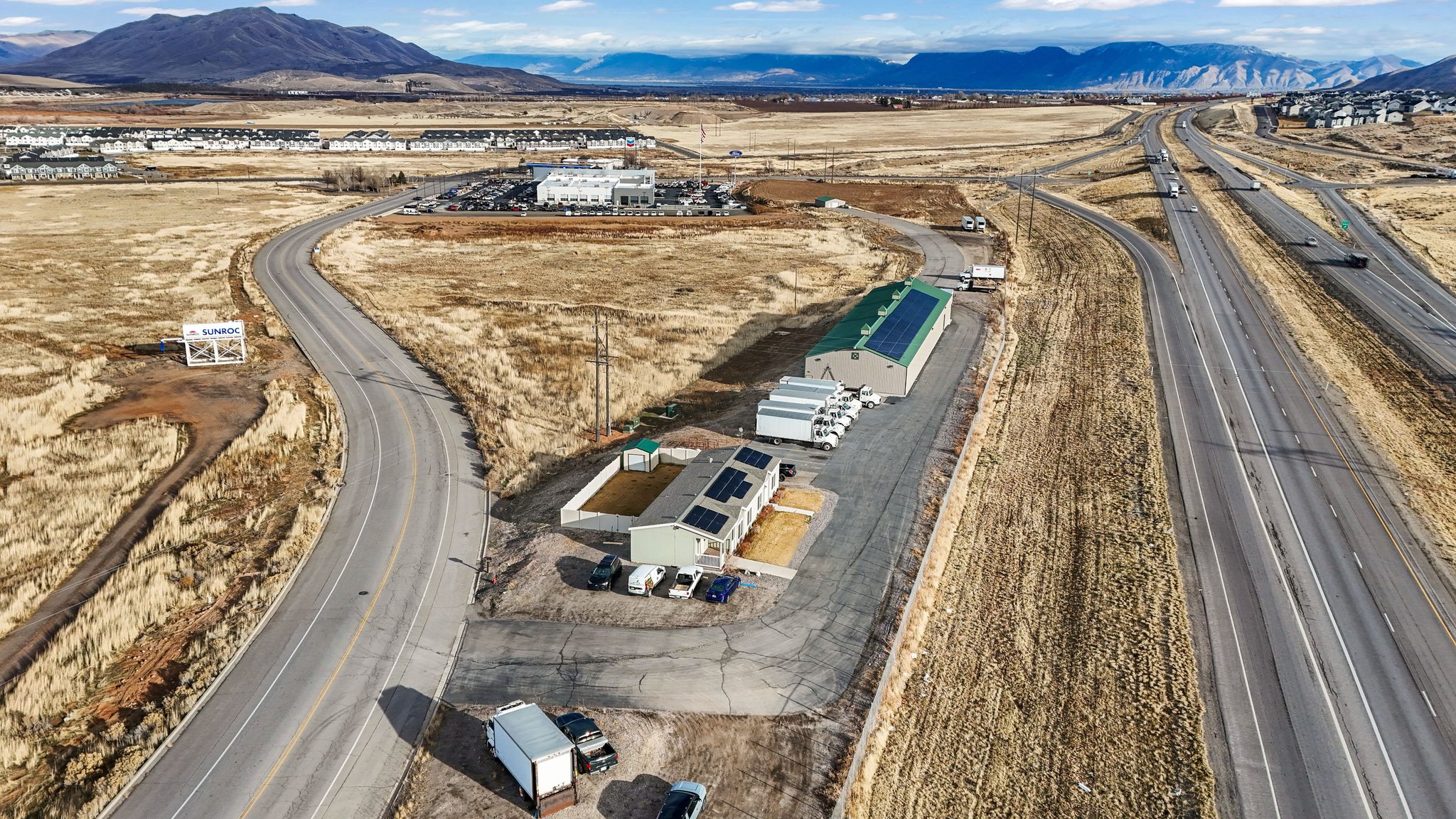 Aerial overview of property's location with mountains