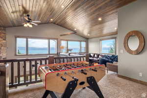 Playroom featuring a ceiling fan, carpet floors, wood ceiling, and recessed lighting