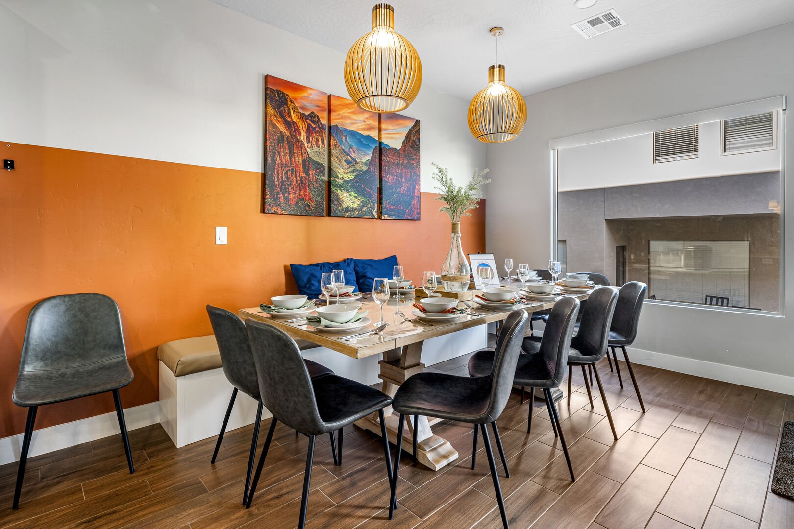 Dining space with wood finish floors and baseboards