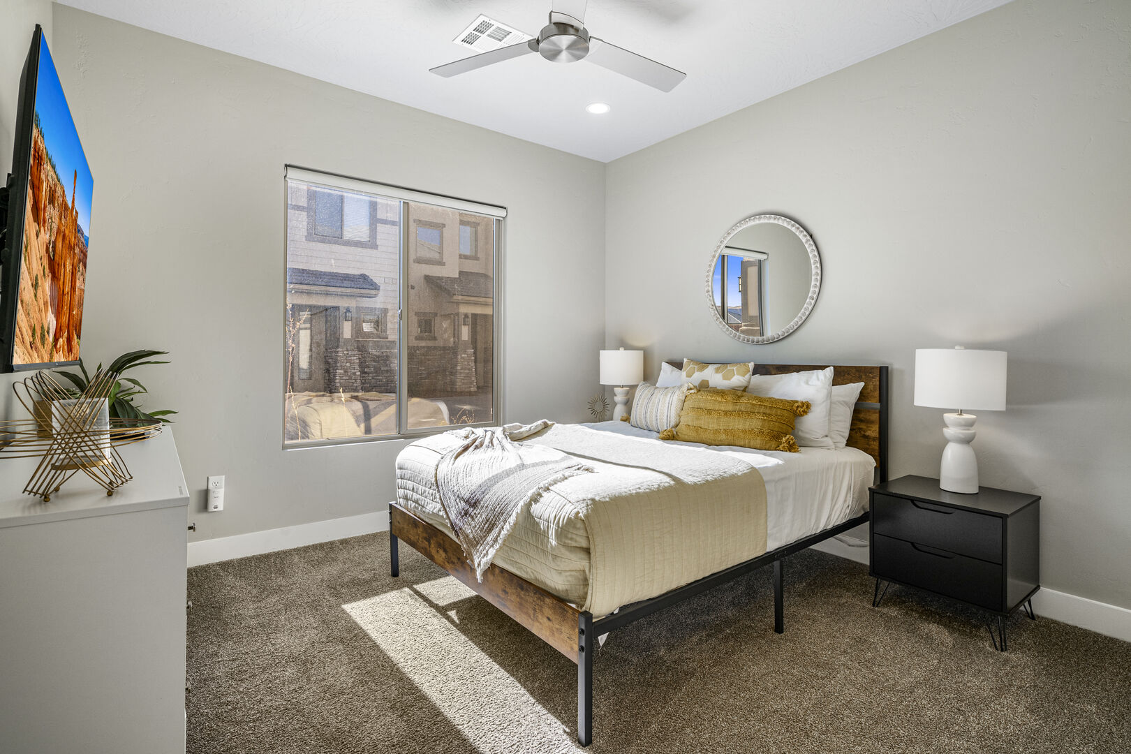 Bedroom with carpet and ceiling fan