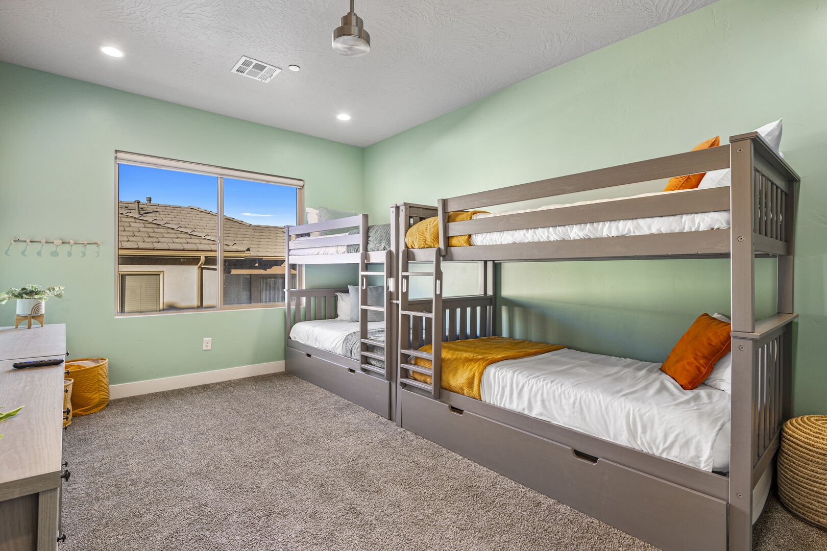 Carpeted bedroom with recessed lighting and a textured ceiling
