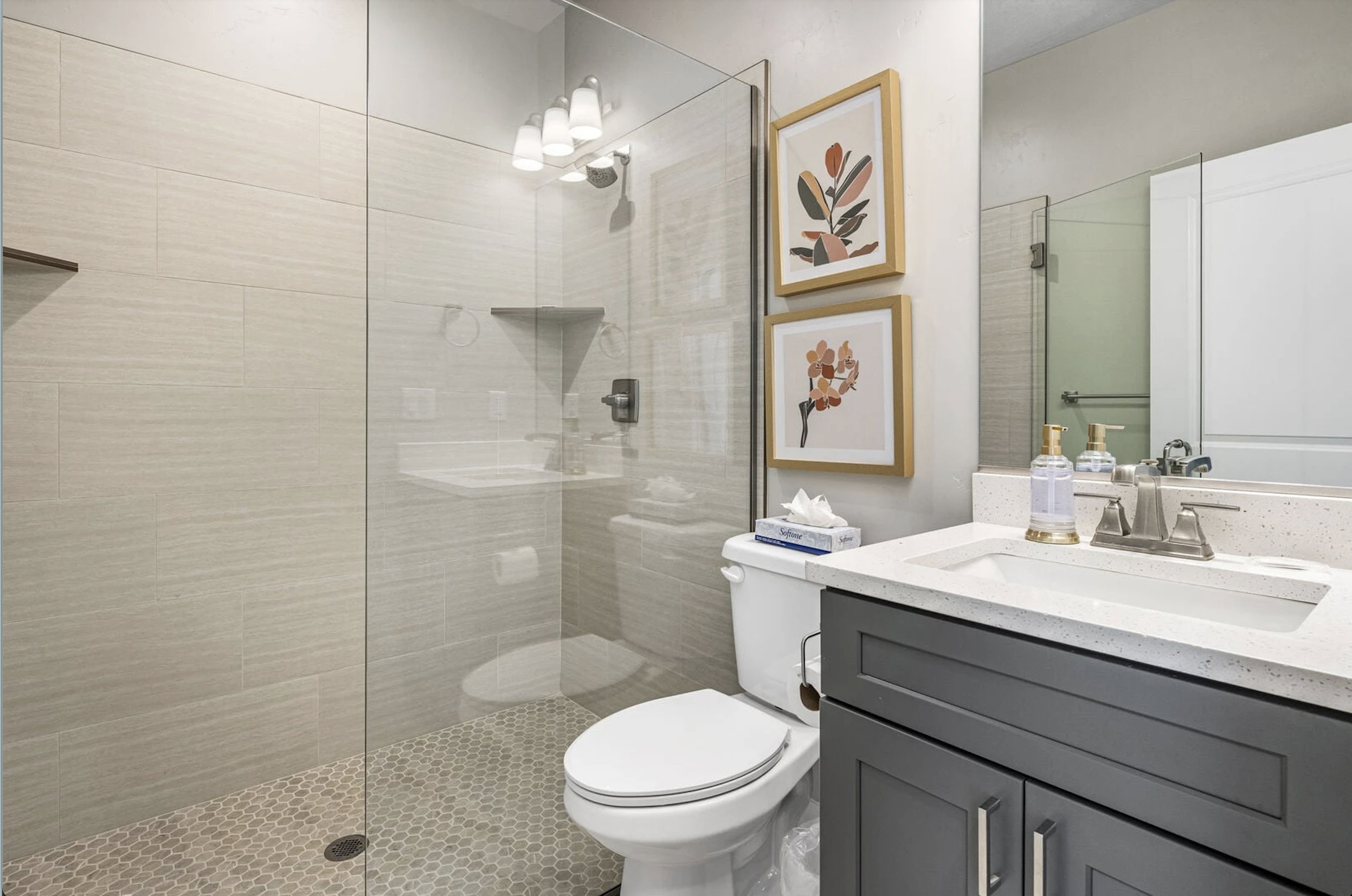Bathroom featuring vanity and walk in shower