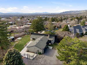 Aerial view of residential area featuring mountains