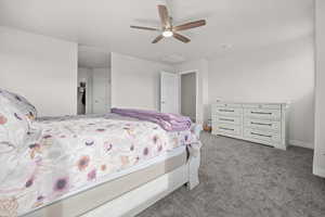Primary bedroom featuring with ceiling fan