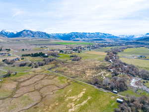 Aerial view of sparsely populated area featuring a mountainous background