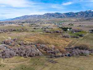View of mountain background featuring rural landscape
