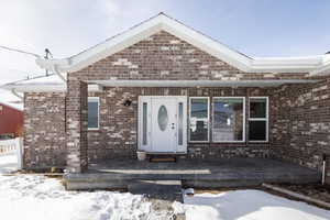 View of front of property with brick siding