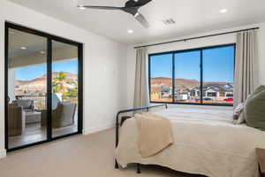 Carpeted bedroom with a mountain view, access to outside, a ceiling fan, and recessed lighting