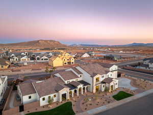 Aerial view at dusk of a residential view and a mountain view