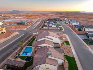 Aerial view of residential area with a mountainous background