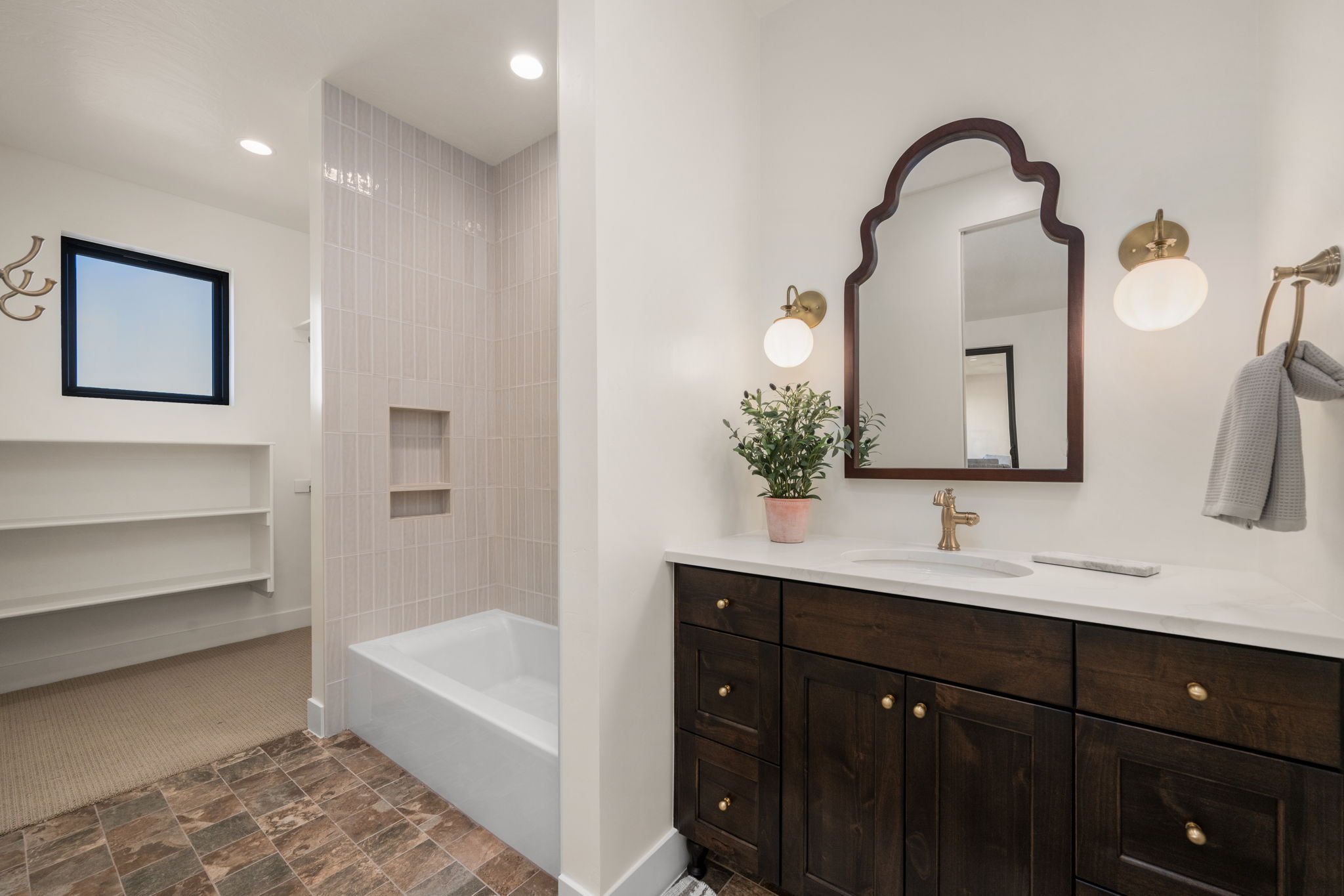 Full bath with vanity, stone finish floors, tub / shower combination, and recessed lighting