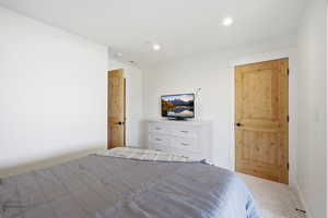 Bedroom featuring carpet and recessed lighting