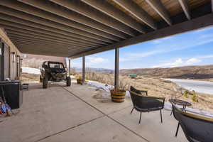 View of patio / terrace featuring a mountain view