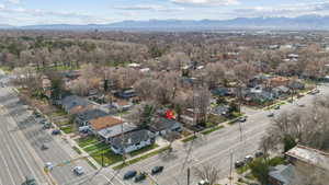 Aerial view of residential area featuring mountains