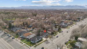Aerial view of residential area featuring a mountainous background