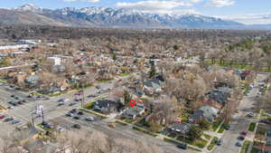 Aerial view of residential area featuring mountains
