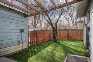 View of fenced backyard