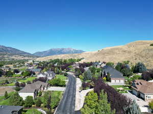 Mountain view featuring nearby suburban area
