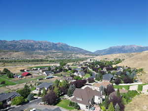 Aerial view of residential area featuring mountains