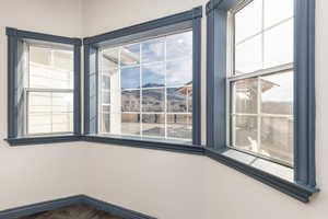 Detailed view of a mountainous background and wood finished floors