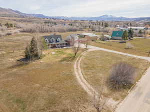 Overview of rural landscape with a mountain backdrop