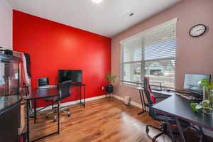 Office area featuring light wood finished floors and baseboards