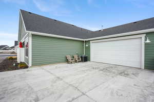 Garage featuring driveway