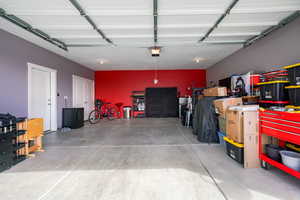 Garage with freestanding refrigerator