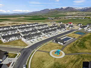 Aerial view of residential area featuring mountains