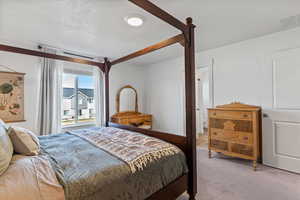 Bedroom with carpet flooring