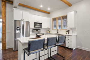 Remodeled Kitchen w/ an expanded island and new quartz countertops!