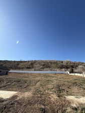 View of yard with a view of rural / pastoral area