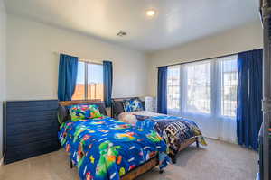 View of carpeted bedroom