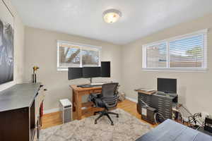 Office featuring baseboards and light wood-style floors