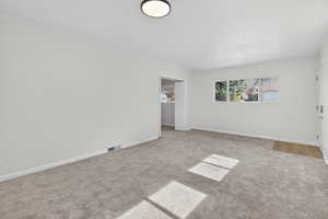 Flex-space featuring plenty of natural light, neutral carpeting and a private entry. Possible ADU conversion, rental income, or a guest wing (buyer to verify city requirements).