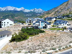 View of mountain backdrop with nearby suburban area
