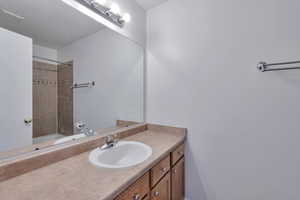 Full bathroom with vanity