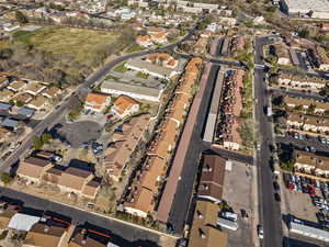 Aerial overview of property's location with nearby suburban area