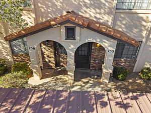 View of front facade featuring brick siding